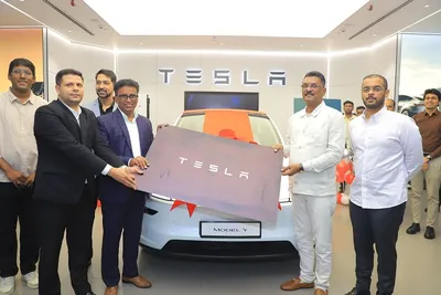tesla delivers first model y in india to maharashtra minister