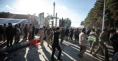 middle east tense after twin blasts kill over 100 in iran