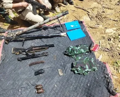 manipur  weapons and explosives hidden in cemetery recovered in churachandpur