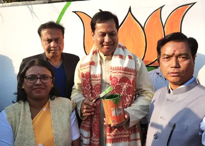 assam  sonowal chides governance by congress as  dark era 