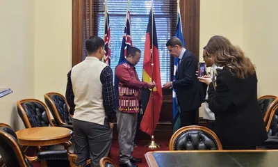 mizoram  australia based groups and mzp sign tripartite agreement to aid refugees