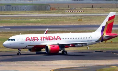 air india plane catches fire after landing at delhi airport  passengers safe