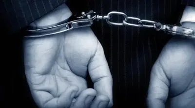 2 acs officers arrested in land fraud scam in guwahati