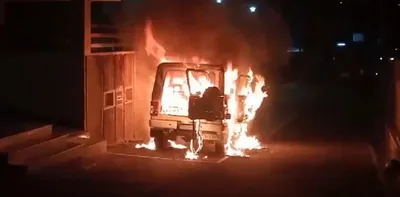 meghalaya violence  amid petrol bomb attacks  government vehicle set on fire