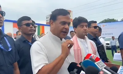 assam  tai ahoms stage torch rally  warn bjp of election boycott