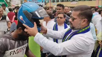 tripura transport department distributes free helmets to raise awareness