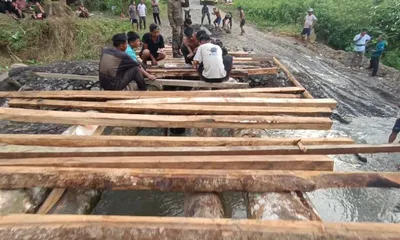 arunachal  chatong villagers build own wooden bridge  end isolation