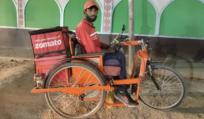 assam  26 year old youth redefines courage with zomato delivery job after losing legs in accident