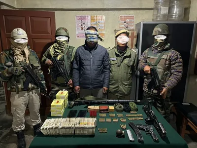 manipur  arms dealer arrested with rs 13 lakh and a cache of warlike weapons in ukhrul