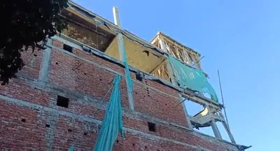 48 year old woman dies after under construction building wall collapses in dibrugarh