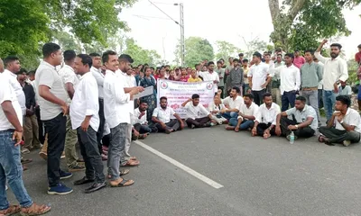 assam  protesters block nh 37 demanding compensation after two youths killed in doomdooma