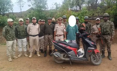 manipur  21 year old arrested with 2 kg opium hidden in bike