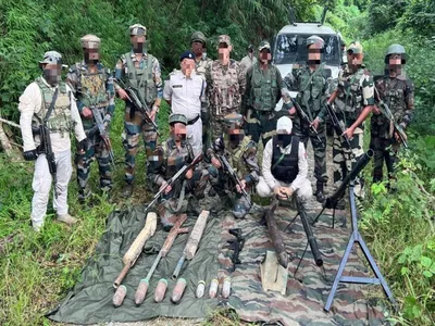 manipur  security forces seize huge arms cache