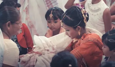 how assamese people celebrates first menstruation period 