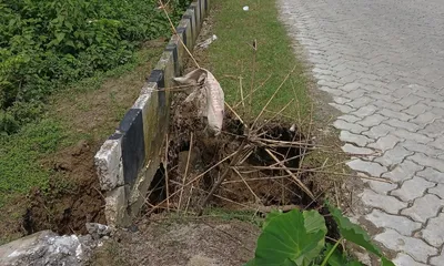 assam  erosion hits dhola–sadiya link road following pre monsoon rains  commuters at risk