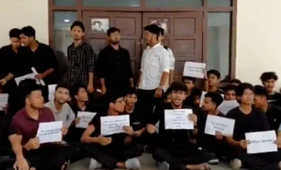 assam  cotton university students block vc office  protest against administrative delays