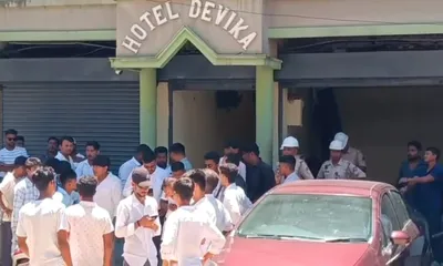 assam  students  union stages protest against devika hotel over owner’s alleged misbehavior
