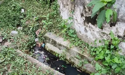 assam  dibrugarh residents flag clogged drains at thana chariali ahead of monsoon