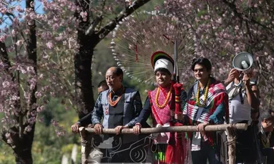 nagaland  jyotiraditya scindia joins cm neiphiu rio at hornbill festival’s stone pulling ceremony