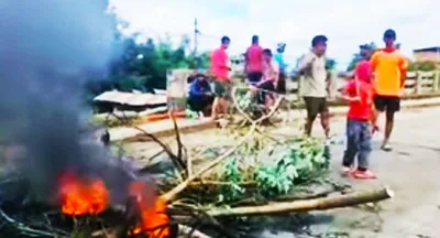 manipur  protesters block road and disrupt utilities in imphal east