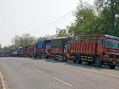 manipur  over 350 trucks plying to imphal from silchar stranded on nh 37