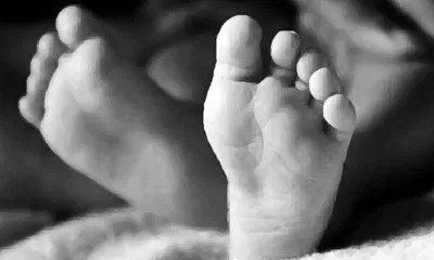 tripura  14 month old girl found buried in paddy field  relative arrested in assam