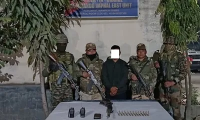 manipur  man arrested with slr rifle and ammunition in imphal east