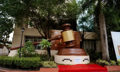 assam  supreme court judge unveils one of india’s largest gavels at royal global university