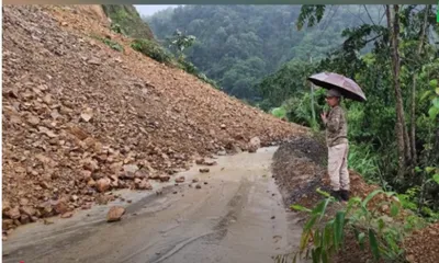 manipur  landslides block silchar imphal road  over 80 vehicles stranded