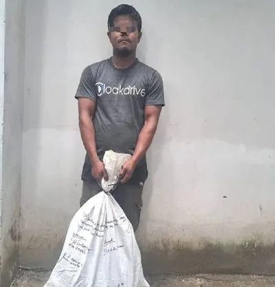 manipur  drug peddler held with 230 grams of heroin in imphal