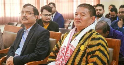 bhutanese delegation visits girijananda chowdhury university in assam for educational odyssey