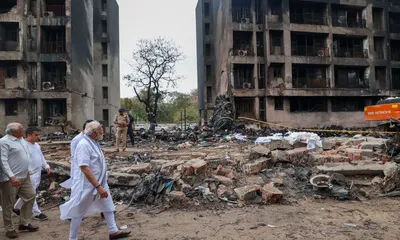 pm modi visits ahmedabad air india crash site after tragedy claims 265 lives