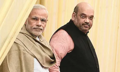 congress demands pm modi  amit shah exit after ed setback in national herald case