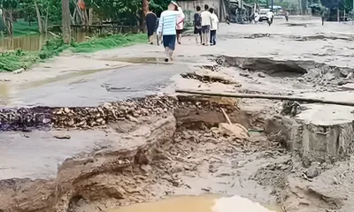 assam  rain  storm lash lakhimpur  overflowing river damages key road