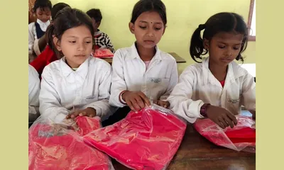 assam  jorhat s hemolota handique trust distributes sweaters  promotes tree planting at kandhulimari school