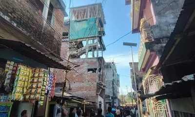 assam  dibrugarh municipal corporation demolishes unauthorised four storied building following fatal accident