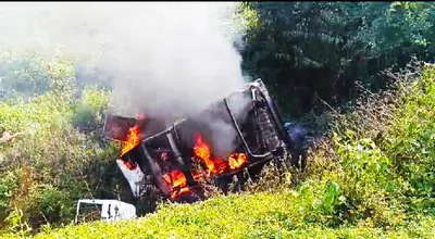 manipur  police vehicle engaged in anti drug campaign set ablaze by mob