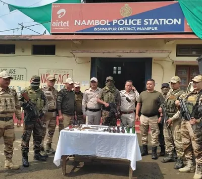 weapons and explosives seized from two abandoned camps in manipur