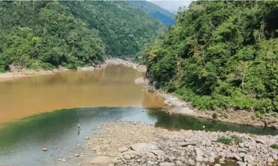 meghalaya  shillong dawki road construction turns umngot river polluted  nhidcl fined