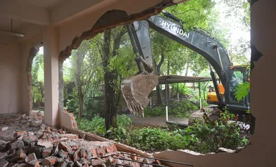 assam  gmda carries out demolition drive at okd institute