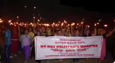 manipur  imphal residents hold torchlight rally against recent killings