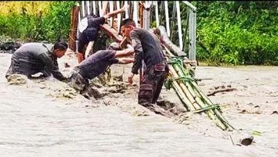 manipur  army repairs footbridge while efforts continue to restore nh 37