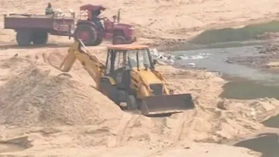 assam  dibrugarh admin bans sand mining after erosion in mohanaghat