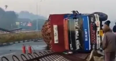 assam  dergaon becomes accident hotspot  lpg cylinders laden truck turns turtle