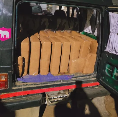 tripura  fake bsf vehicle detained with cannabis worth rs 76 lakh