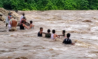 assam  sudden rise in river water leaves eight stranded at karbi anglong picnic spot